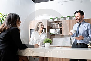 Business team having a coffee break in office