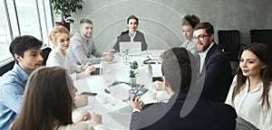Business team having meeting in boardroom, discussing business strategy