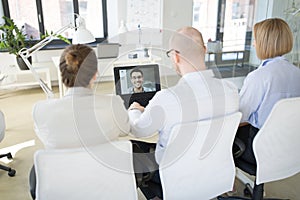 Business team having video conference at office