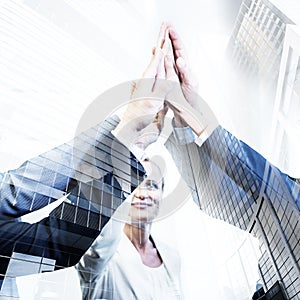 Business team high five, double exposure with modern finance arc