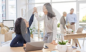 Business team, high five and women celebrate success, win or target achievement in office. Diversity people or employee