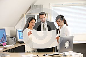 Business team holding paper