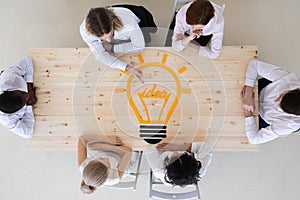 Business team with ideas bulb