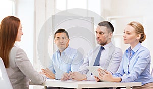 Business team interviewing applicant in office