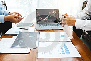 Business Team Investment Entrepreneur Trading discussing and analysis graph stock market trading,stock chart concept photo