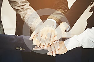 Business team joining hands togethe