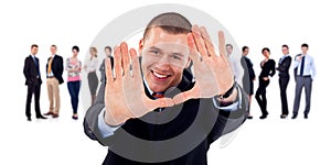Business team leader making hand frame gesture