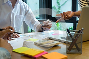 business team man and woman work with laptop on wood table