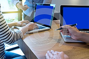 business team man and woman work with laptop on wood table