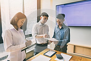 Business team meeting and discussing project plan. Businessmen discussing together in meeting room. Professional investor working