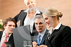 Business - team meeting in an office