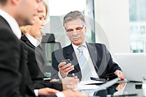 Business - team meeting in an office