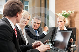 Business - team meeting in an office