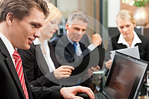 Business - team meeting in an office