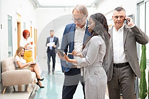 Business team of men and women in an office