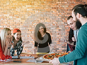 Business team millennials lunch break pizza meal