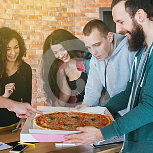 Business team millennials lunch break pizza meal