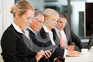 Business - team in office checking mails