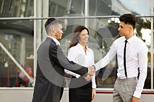 Business Team. People shake hands communicating with each other