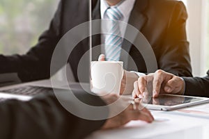 Business team seminar meeting partnership concept.  Close up hands of businessman on the table during meeting in conference room