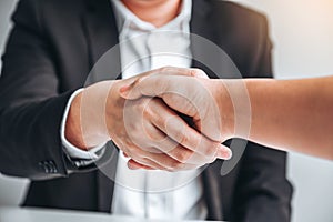 Business team shaking hands during a meeting Planning Strategy Analysis Concept