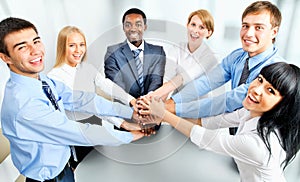 Business team showing unity with their hands