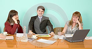 Business team sits at the table