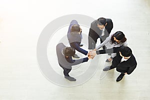 Business team successful standing with their hands together, Partner connection concept.