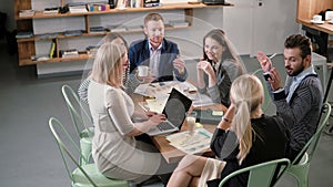 Business team at the table. meeting diverse people participating in creative sustainable ideas in modern startup office.