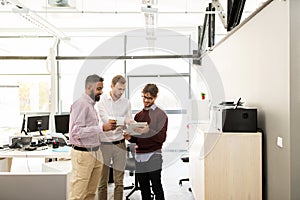 Business team with tablet pc and coffee at office