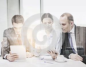 Business team with tablet pc having discussion