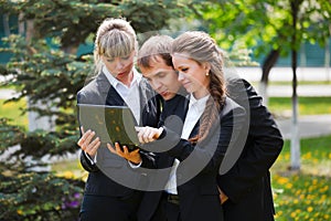 Business team using laptop