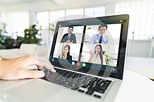 Business team using laptop for a online meeting in video call