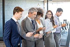 Business team using their mobile phone