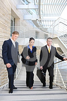 Business Team walking up Stairs