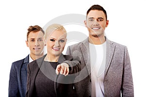 Business team-woman pointing at camera