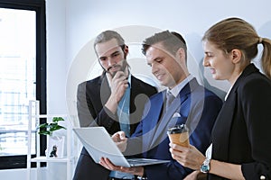 Business team working on master plan. Happy smiling businessman and businesswoman talking about success marketing plan after