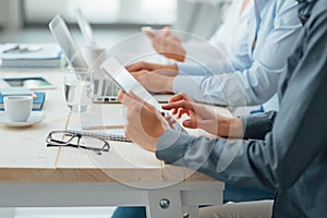 Business team working at office desk photo