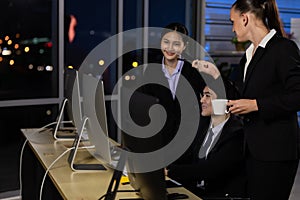 Business team working overtime late at night in call center office. Concept for business at night