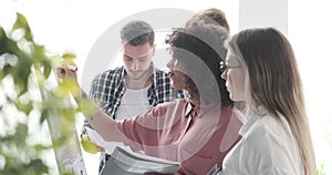 Business team working on whiteboard at office