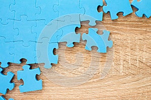 Business teamwork concept by jigsaw puzzle pieces