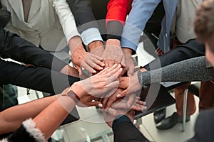 Underneath view, Business teamwork groups people hands, stacked photo
