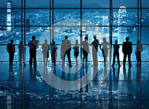 Business Teamwork in the Office at Night