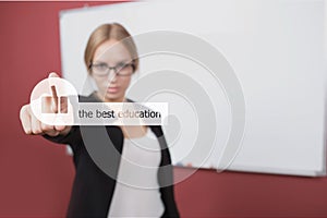 Business, technology, internet concept - businesswoman pressing best education button on virtual screens