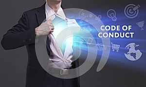 Business, Technology, Internet and network concept. Young businessman shows the word: Code of conduct