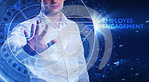 Business, Technology, Internet and network concept. Young businessman shows the word: Employee engagement