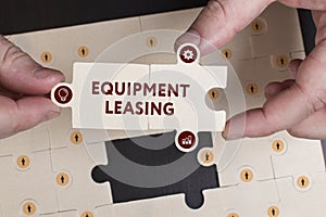 Business, Technology, Internet and network concept. Young businessman shows the word: Equipment leasing photo