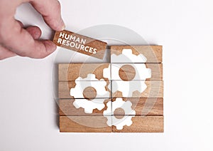 Business, Technology, Internet and network concept. Young businessman shows the word: Human resources