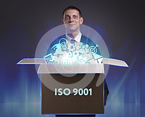 Business, Technology, Internet and network concept. Young businessman shows the word: ISO 9001