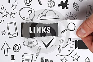 Business, Technology, Internet and network concept. Young businessman shows the word: Links